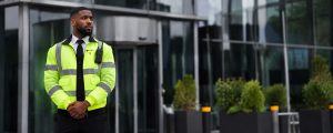 a security officer on shift outside a corporate office